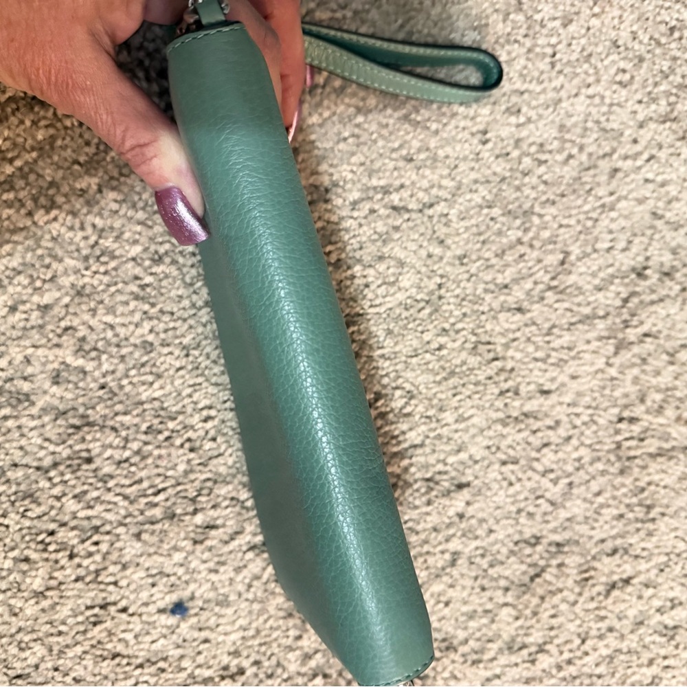 Coach Mint Green Leather Wristlet
Matching Bag in my closet Bundle for Deals! - Picture 6 of 8